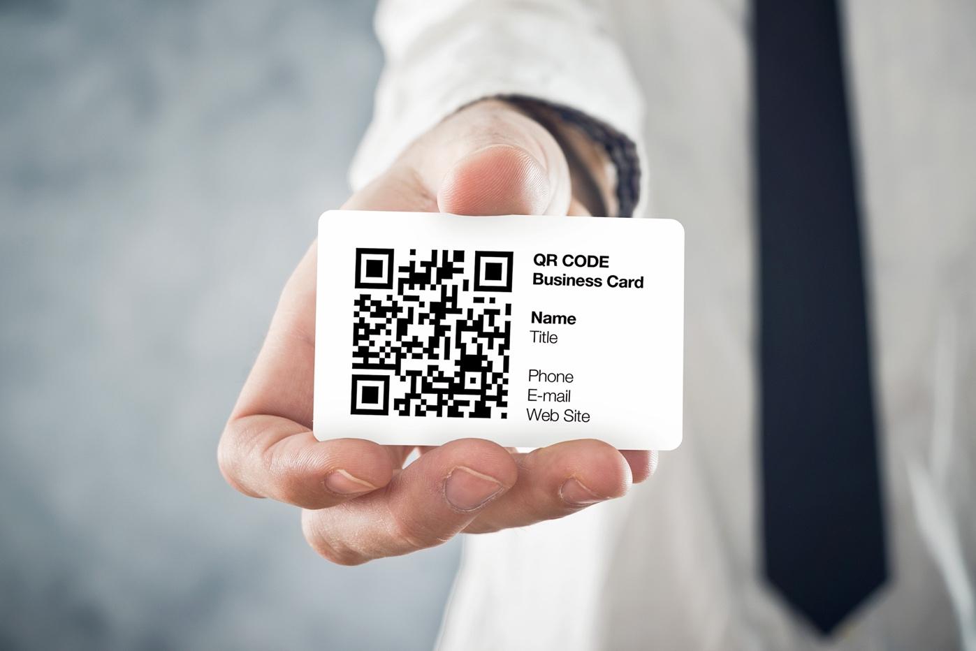 a man with QR code business card